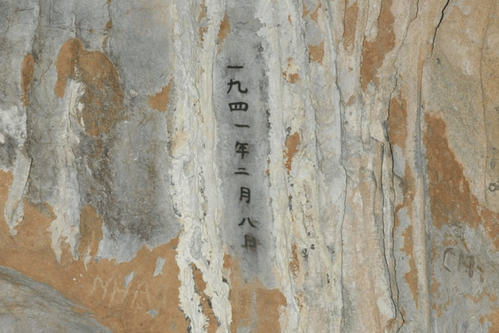 Visitors can still see Uncle Ho&rsquo;s charcoal inscription marking the exact date he arrived at Coc Bo Cave in 1941